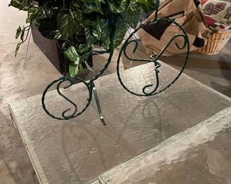 68. 2 metal tables with glass tops and one tricycle planter $40