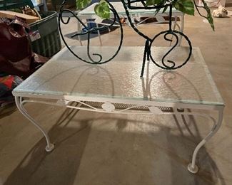 68. 2 metal tables with glass tops and one tricycle planter $40