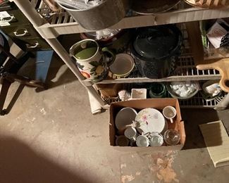 70. TWO shelves and box of cookware and dishware and planters $35