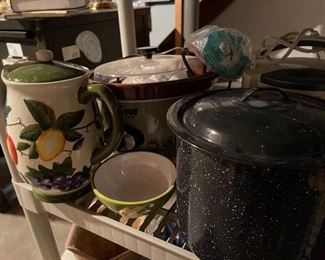 70. TWO shelves and box of cookware and dishware and planters $35