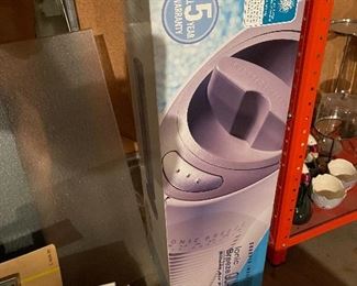 71. Shelving, some in box, projection screen, and other pices shown.  Fan in box $35