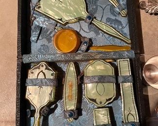 77. Silverplate, hanging / standing frame, and antique makeup set with lusterware $45