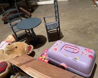 63. Dolls, dolls and some 1940s paper mache little individual guys. Also a Barbie Kaboodle and barbie card game and small wood blue dining set for a doll $50