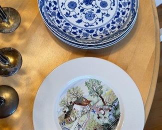 80. Table contents including candlesticks and matching wine glasses, and some Poppytail plates/ bowls. $75