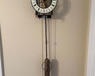82. Grandmother clock, wall hung and from German maker, Hermle.  Works great.   looks great.  $200
