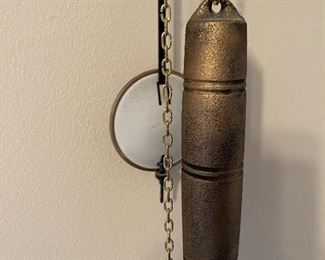 82. Grandmother clock, wall hung and from German maker, Hermle.  Works great.   looks great.  $200