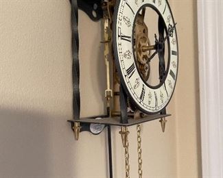 82. Grandmother clock, wall hung and from German maker, Hermle.  Works great.   looks great.  $200