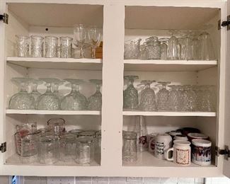 86. Cabinet of drinking glasses ang mugs $25