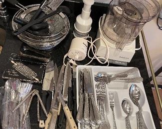 88. Nice set of flatware, cuisinart food processor, hand chopper and some knives. $65