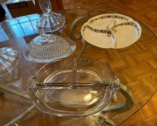 90.  Glass table full of plates and 2 amazing Crystal Candelabras $75