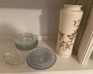 92. 8 shelves of items, including plates, clocks, and more $40