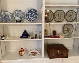 94. Six shelves including blue spode plates, and more with leather vintage makeup bag carrying case suitcase $65