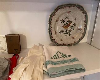 94. Six shelves including blue spode plates, and more with leather vintage makeup bag carrying case suitcase $65