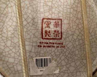 94. Six shelves including blue spode plates, and more with leather vintage makeup bag carrying case suitcase $65