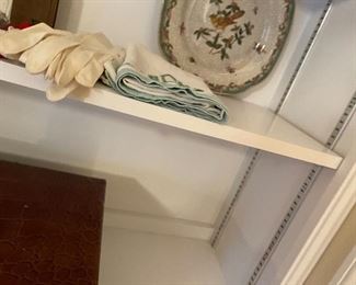 94. Six shelves including blue spode plates, and more with leather vintage makeup bag carrying case suitcase $65