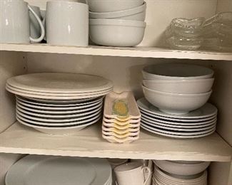 97. Cabinet of dishes and plates and bowl with decorative italian waiter items $50