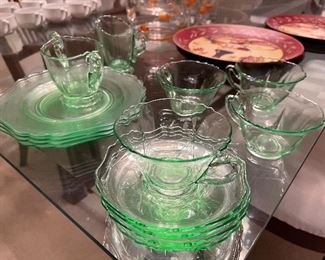 101. Green Vaseline ware and 2 other plates with an awesome old hand painted orange juice pitcher and cups  $ 50