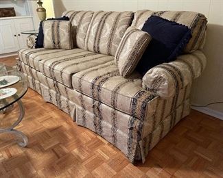 104. Beautiful and rarely used striped sofa $250