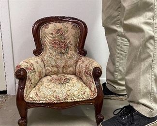 112. Small tiny upholstered antiqeu style chair for you dolly!  Awesome and authentic.  Not very old, I think.  $35