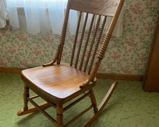 CLEARANCE  !  $30.00 NOW, WAS $100.00....................Beautiful Antique Rocking Chair, pretty Spindles and carved back (P836)