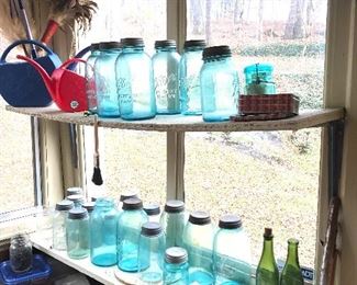 collection of blue mason jars with galvanized lids