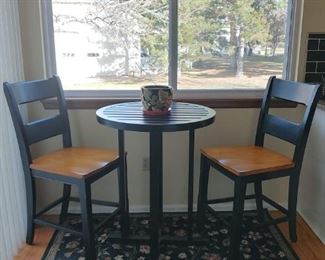 bistro table and two chairs
