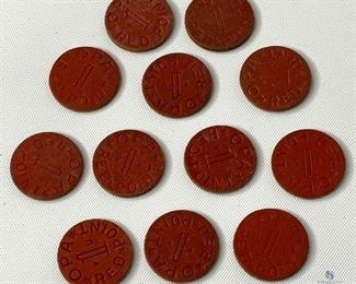Red WW2 Office of Price Administration (OPA) tokens.
