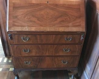 Fall front desk with leather inset. 39” high X 29” wide X 16” deep. $225