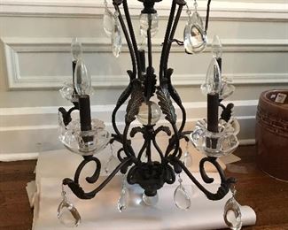 Metal chandelier with crystal accents. 45” deep X 24” wide. $250