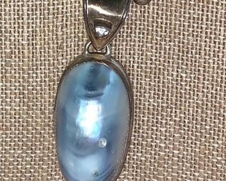 Roberta Chairella Sterling Necklace and Pendant. Chais is marked "Roberta Chariella". The pendant is not marked with her hallmark an is marked 925 for sterling. The chain measures 15.5". 