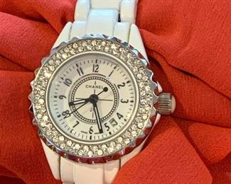 Ladies Chanel J12 Watch - amazing beautiful watch by Chanel in working condition.  New battery put in and it works great. 