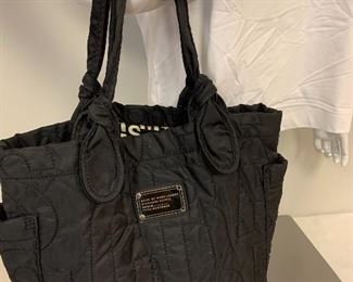 Marc by Marc Jacobs Handbag - made in a nice durable nylon material.  Features inside zipper compartment and two exterior pockets. Measures about 14" W x 13" H 