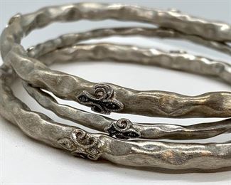 Three Sterling Bangle Bracelets by Rhonda Faber Green - measuring 2.5" inside diameter. 