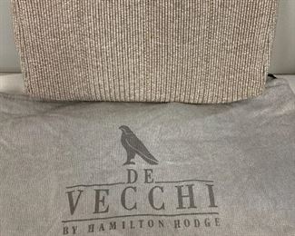 DeVecchi Clutch Envelope Clutch. This wonderful clutch was made in Italy. It has a wooden top and a fabric bottom. It has a very unique open and close design.  This lovely woven clutch was manufactured by De Vecchi of Italy and designed by Hamilton Hodge, who did work for Bottega Veneta, Ferragamo and Donna Karan. This clutch is likely from the early 1990's.  This does have some light wear, however; it is in very good condition. 