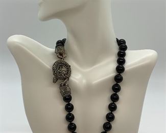 Black Beaded- Marcasite Detailing Necklace with toggle closure. Very classy looking piece of jewelry. Measures 16" long. No manufacture markings. 