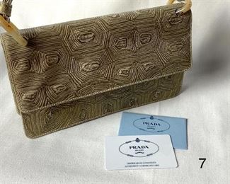Prada Handbag with Certificate of Authenticity

B6772
Tartargua Mordo
Color: Perla
9.5" x 5.5"