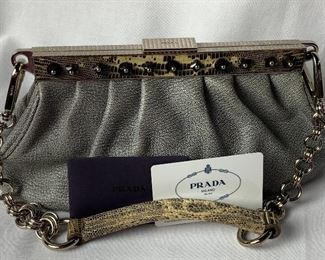PRADA Handbag with Certificate of Authenticity

Borsca Cerniera
Group Name: Calf Skipper FR
Color: Avoria
11" X 6" 