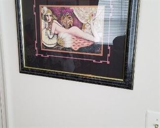various framed fine art pieces