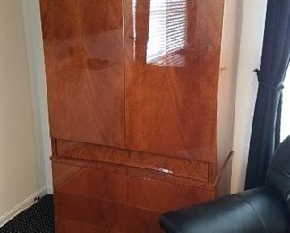 Henrendon linen or clothing armoire, excellent condition. Lacquer on book match walnut