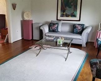 art nouveau, art deco inspired sculpted rug in cream, teal, peach, mauve, black