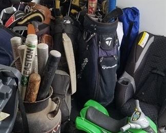 Lots of golf clubs, baseball bats, etc.