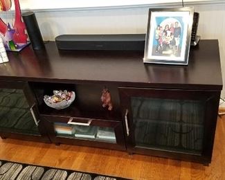 black and glass entertainment cabinet