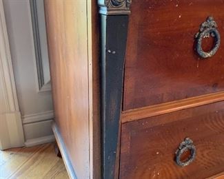 Carved Figure on each end, three drawers with matching metal pulls