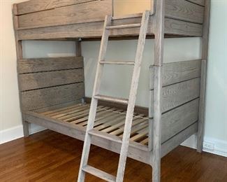 $600. Land of Nod Wrightwood Grey Stain Convertible Bunk, This neutral stained finish is perfect for any gender decorating needs. Converts to 2 twin beds and comes with 2 bed rails. 81”x43’x68”    Retails for $1700                                                Top Twin: 81”x43”x27” Bottom Twin: 81”x43”x42” Ladder: 15”x59”