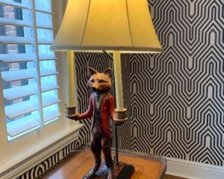 $150. Bill Huebbe,  Fox dressed in Red Coat whimsical lamp. This lamp is sure to be a conversation piece in your home! 32” 