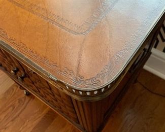 Close up showing intricate detail of leather top of Theodore Alexander Side Table