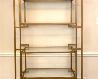 $550. The Greek Key Detail and Brushed Brass of this Etagere allow for a gorgeous, upscale, and glamorous feel! 39"x17.5"x84.5"