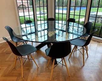 $1000 Restoration Hardware Industrial Spider Table This table is sure to be a conversation piece! It is solid in stature the brushed brass nail heads and lining between beams add to the uniqueness and clean lines of table. 720"x30"                                                                                                $50/each Also Pictured are 8 Mid Century Black Chairs with curved seat support on angular tapered legs with steal accents for comfort and further durability 17"x22"x33"