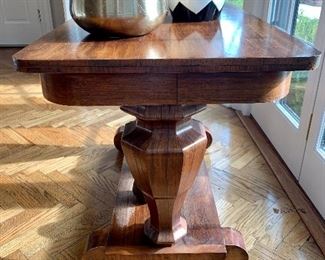 Profile view of antique table.