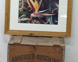 Crate and framed floral photo
